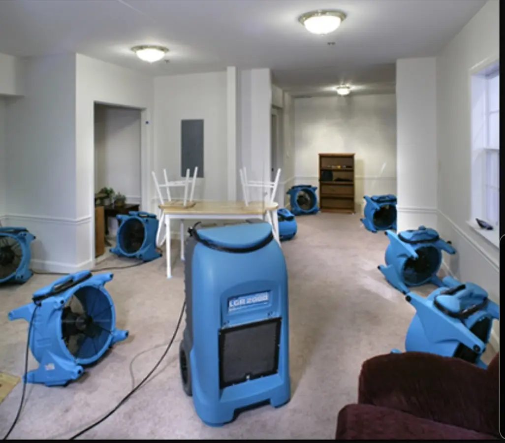 Air movers and dehumidifier setup for Water Damage Restoration in Sturtevant